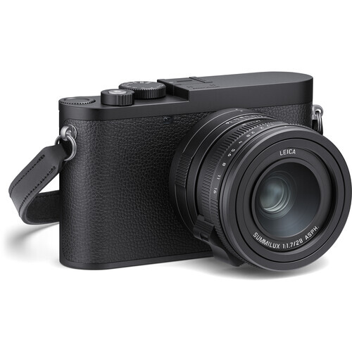 Leica Q2 rangefinder camera with fixed lens and black textured body against white background.