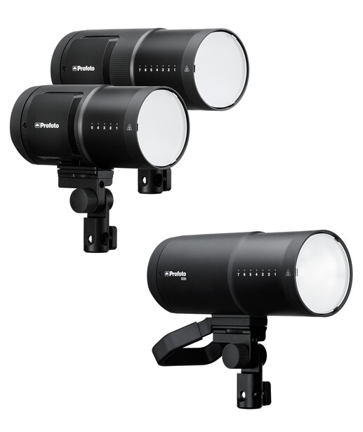 Three cylindrical LED studio lights with control panels, two mounted on a bracket and one mounted separately on a stand.