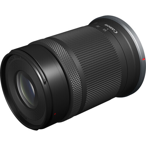 Canon RF-mount telephoto zoom lens with extended barrel and textured grip zones.