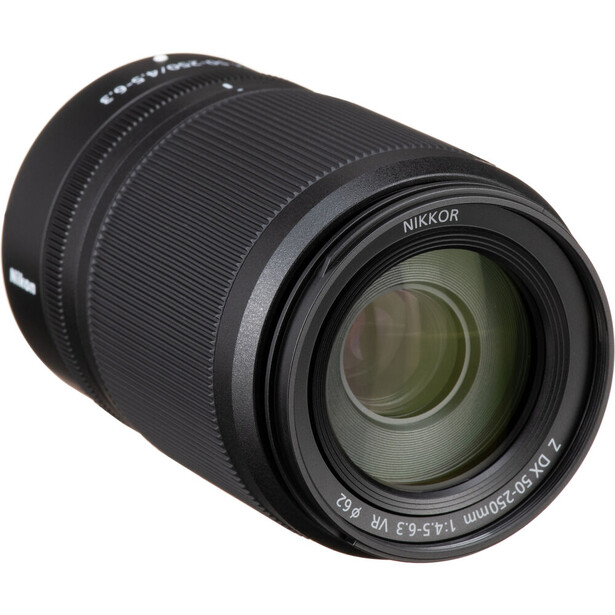 Nikkor telephoto zoom lens with black barrel and multi-element glass optics visible through the front element.