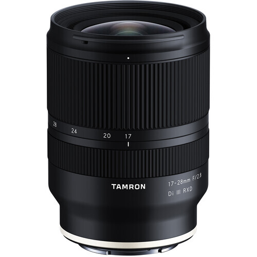 Tamron 17-28mm f/2.8 Di III RXD wide-angle zoom lens with focus ring and distance markings visible.
