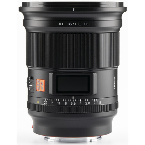 Sony AF 16/1.8 FE wide-angle prime lens with focus ring and depth-of-field scale visible.