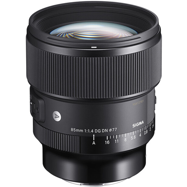 Sigma 85mm f/1.4 DG DN Art lens with dark metal barrel and focus ring against white background.