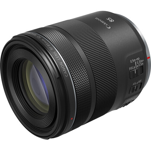 Canon RF-mount telephoto zoom lens with black barrel and glass elements visible.