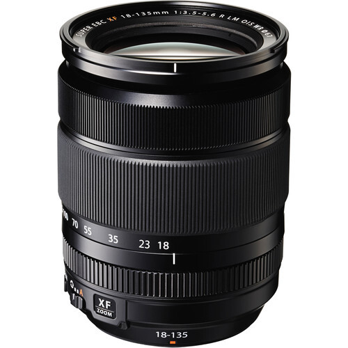 Fujifilm XF 18-135mm f/3.5-5.6 R LM OIS WR zoom lens with focus and zoom rings visible.