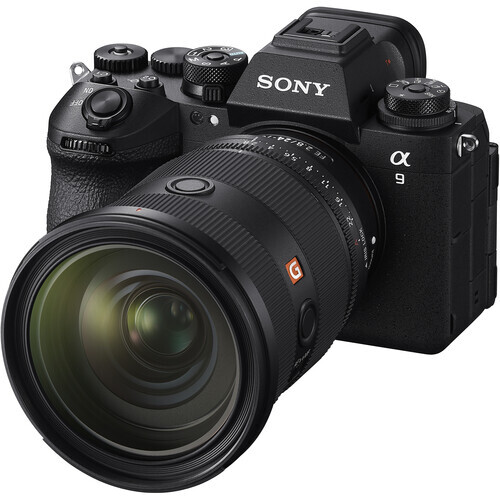 Sony α9 mirrorless camera with attached zoom lens on white background.