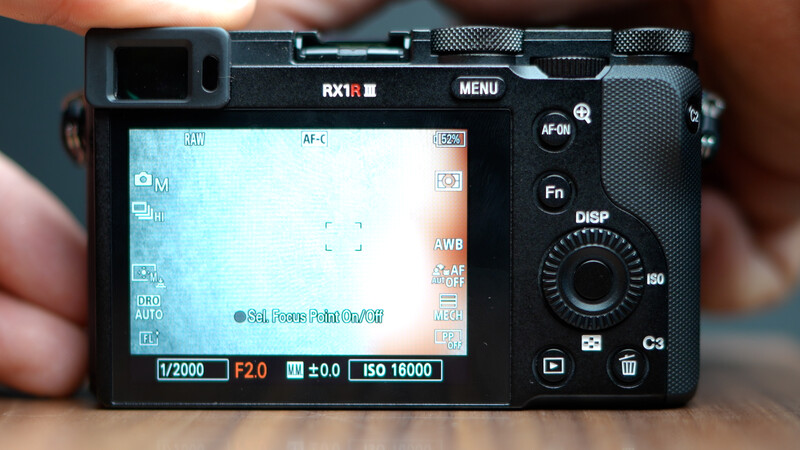 Sony RX1R III camera rear LCD screen displaying exposure settings of 1/2000 shutter speed, f/2.0 aperture, and ISO 16000.