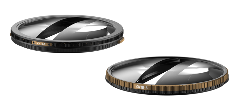 Two circular camera filters with black gradient bands and bronze-colored threaded rings, displayed side by side.