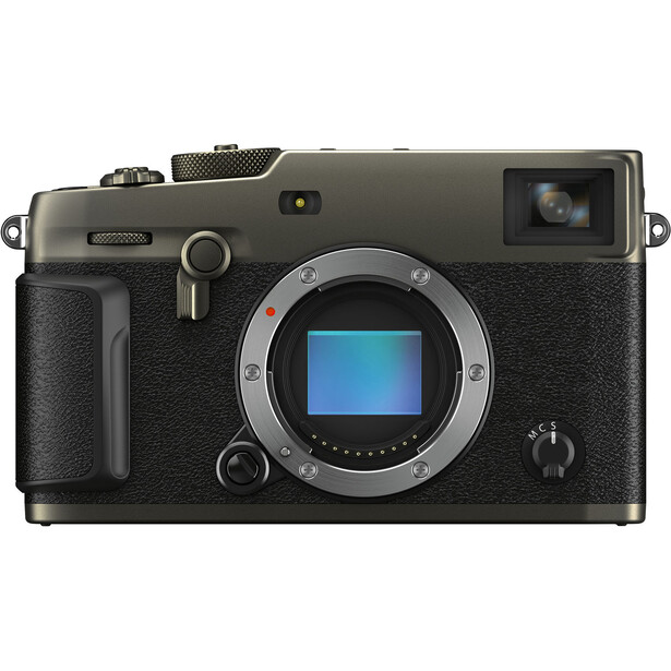Mirrorless camera with titanium top plate and black leather grip, shown from front with sensor exposed.