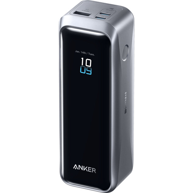 Anker portable power bank with digital display showing 10% battery level and dual USB charging ports.