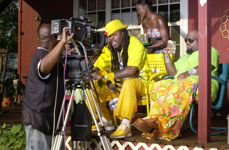 Busta Rhymes on a porch