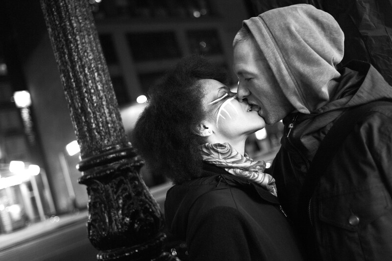 Couple kissing on the street