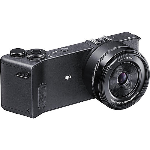 Sigma dp2 Quattro compact camera with fixed 45mm lens and pop-up flash, shown from the right side angle.