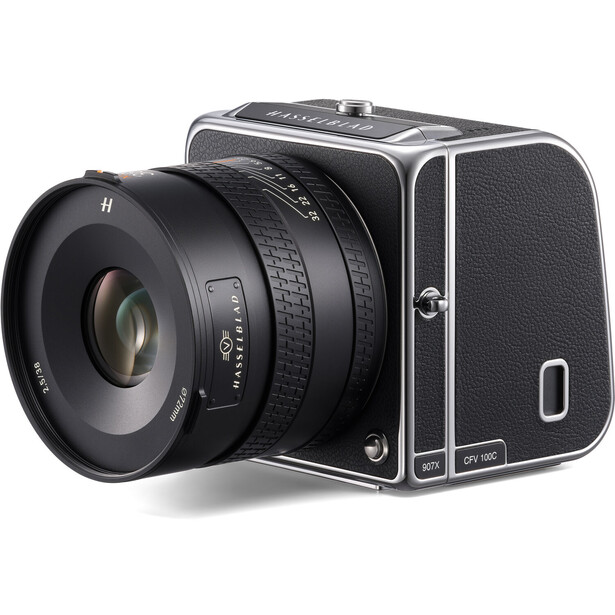 Medium format film camera with interchangeable lens mounted, shown in three-quarter view against white background.
