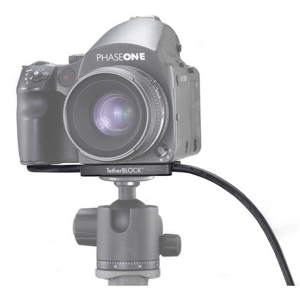 Phase One camera mounted on ball head tripod with tethering cable attached.