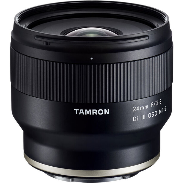 Tamron 24mm f/2.8 Di III OSD M1:2 lens with black barrel and glass elements visible.