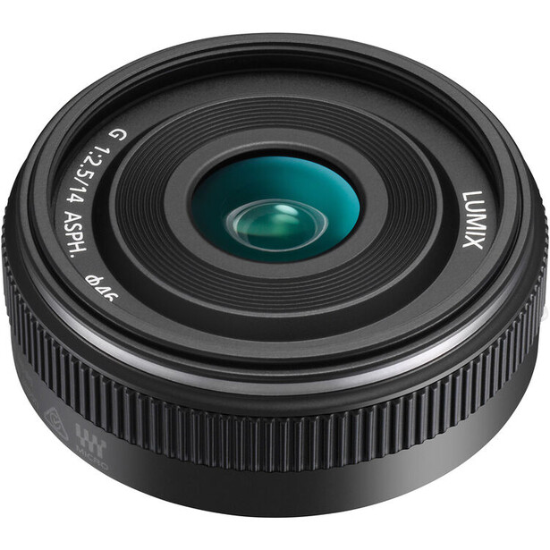 Wide-angle prime lens with teal optical elements and ribbed rubber focus ring.