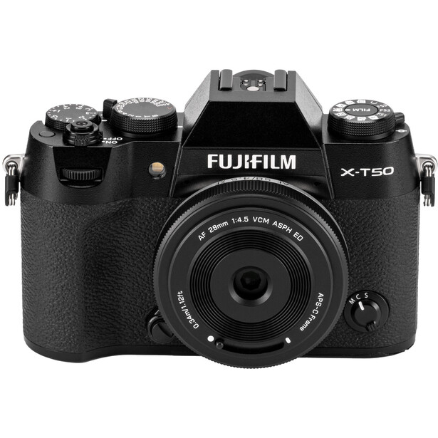 Fujifilm X-T50 mirrorless camera with kit lens, shown from front against white background.