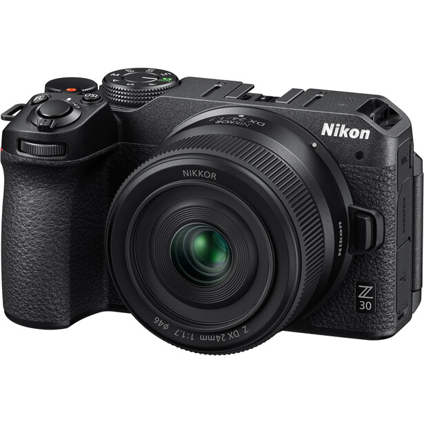 Nikon Z 30 mirrorless camera with attached 18-140mm zoom lens, displayed against white background.