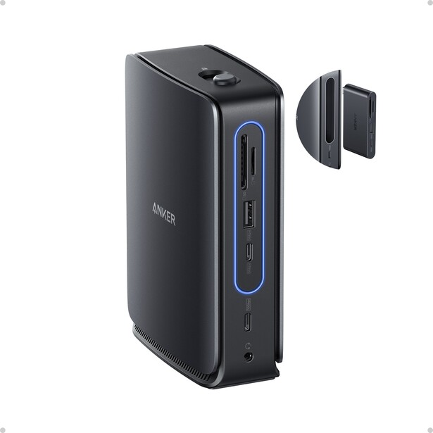 Black desktop docking station with blue accent lighting and detachable stand.