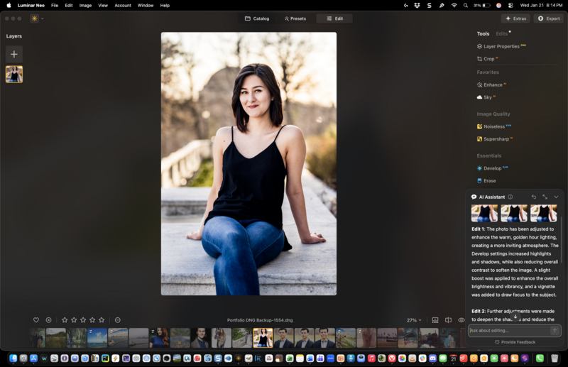 Woman in dark tank top and blue jeans sitting on concrete steps with blurred outdoor background.