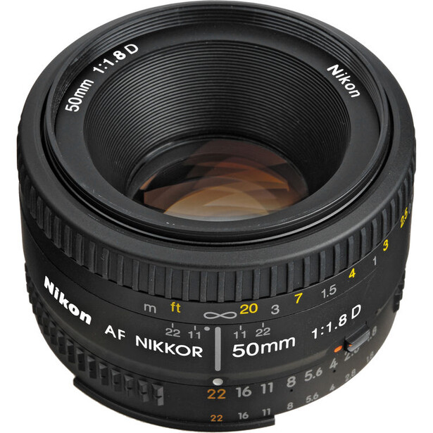 Nikon AF Nikkor 50mm f/1.8 prime lens with aperture ring and focus distance markings visible.