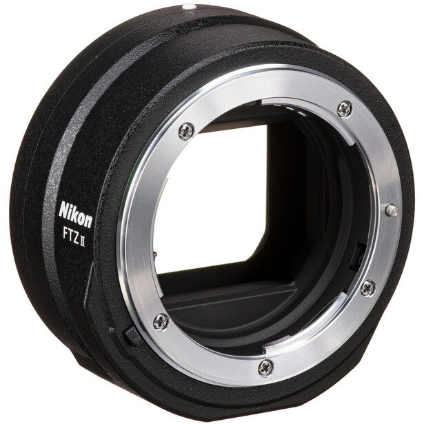 Nikon FTZ lens mount adapter with chrome and black metal construction, shown against white background.