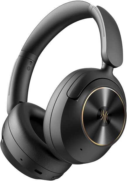 Black over-ear headphones with gold accents and padded headband against white background.