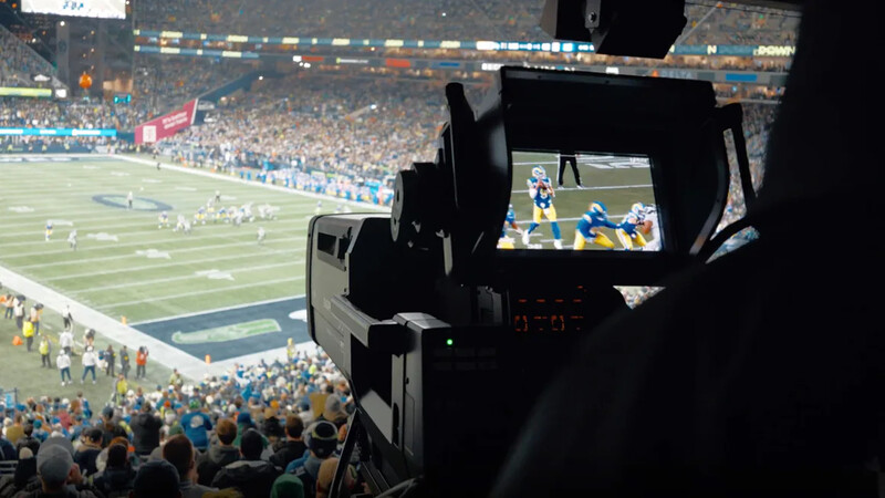 an image of a Sony broadcast camera capturing an NFL game 