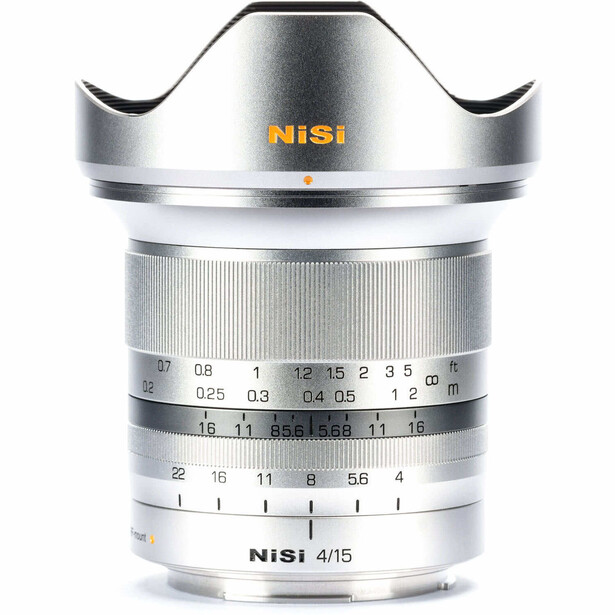 NISI 4/15 manual focus lens with silver metal barrel and crown-style lens hood.