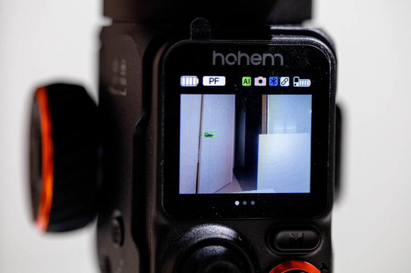 Thermal imaging camera display showing two-panel thermal view of an interior space with temperature gradients visible.