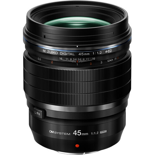 OM System 45mm f/1.2 prime lens with black barrel and green-tinted front element.