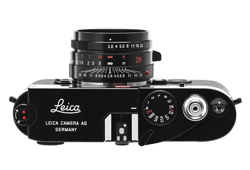 Top-down view of a black Leica rangefinder camera with mounted lens, showing aperture ring and shutter speed dial.