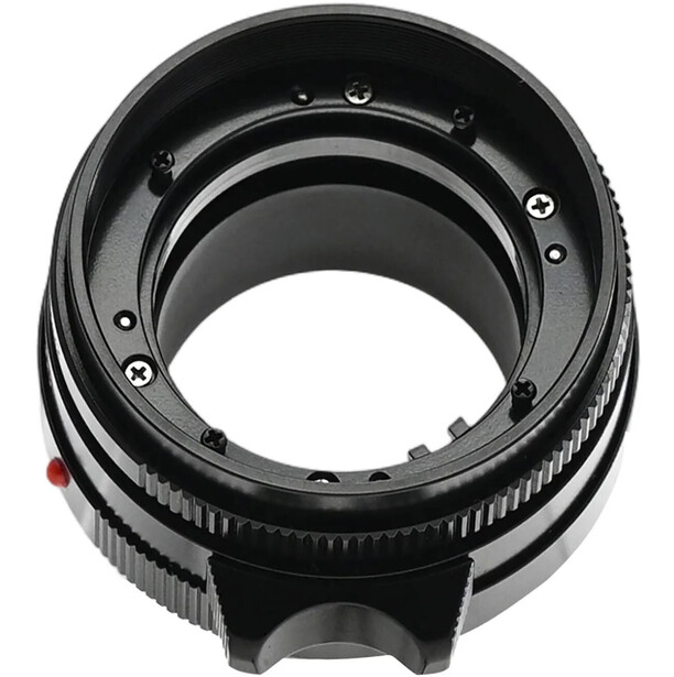 Lens adapter with multiple nested rings and manual focus helicoid mechanism shown in cross-section.