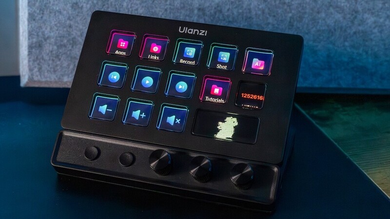 Ulanzi streaming control panel with illuminated button grid and physical knobs on dark surface.