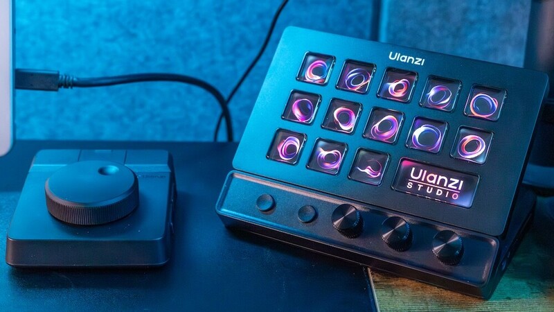 Ulanzi Studio lighting control panel with illuminated buttons next to a wireless remote control.