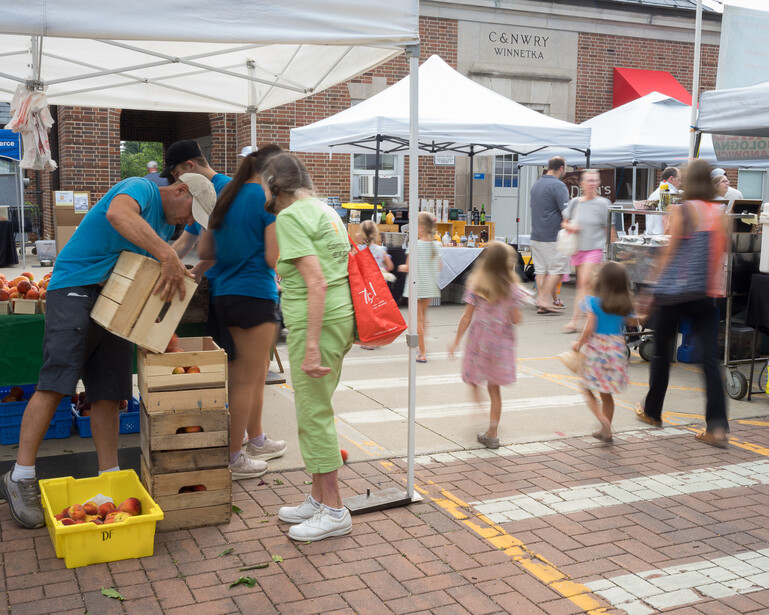 Street photo of summer farmers market