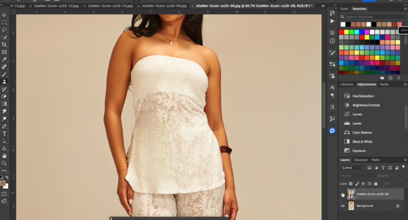 Screenshot of Adobe Photoshop showing a portrait of a woman wearing a white strapless top against a neutral beige background.