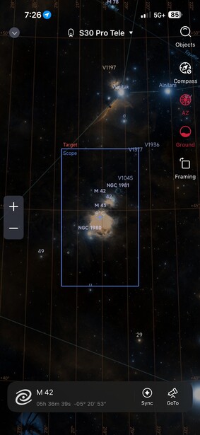 Screenshot of a starfield astronomy app displaying nebulae and star clusters with observation tools and metadata overlay.