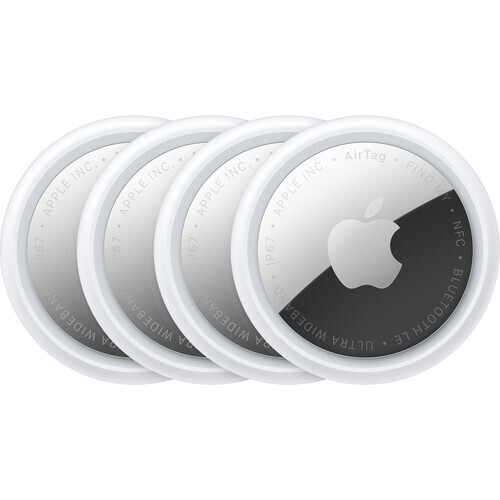 Four silver circular tracking devices arranged in a row, with the rightmost device displaying a dark section.