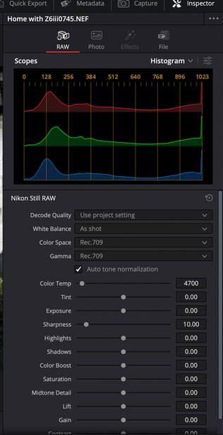 Screenshot of photo editing software showing histogram and color grading adjustments panel.