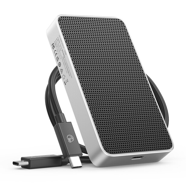 Portable solar panel charger with black mesh surface and white frame, displayed with kickstand and charging cable.