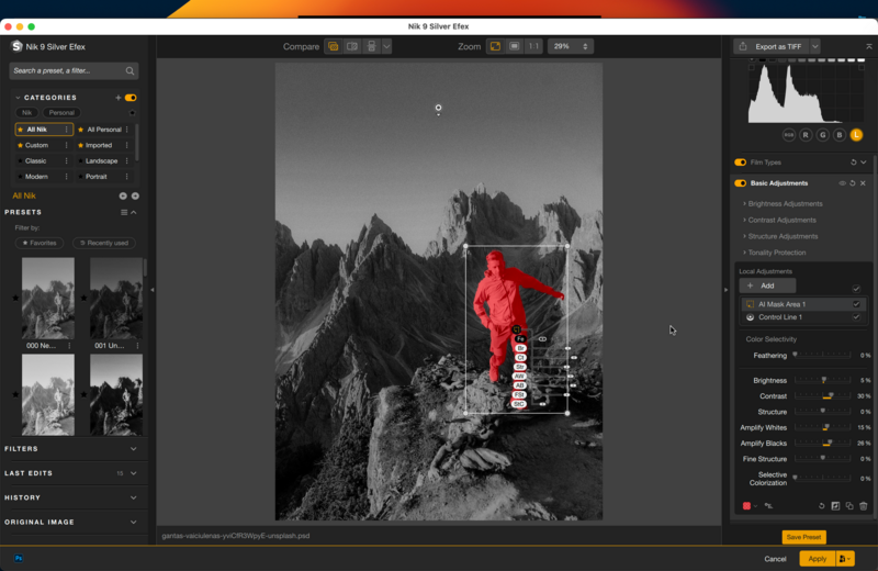 Screenshot of photo editing software showing black and white mountain landscape with red selective color overlay.