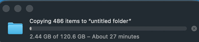 Screenshot of a file copy operation showing 486 items being copied to an untitled folder at 2.44 GB of 120.6 GB with approximately 27 minutes remaining.