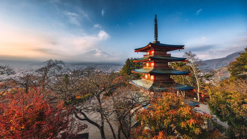 Sunrise over Mount Fuji and a pagoda 