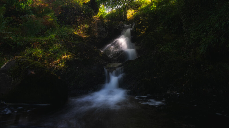 Dappled light on a hidden cascade