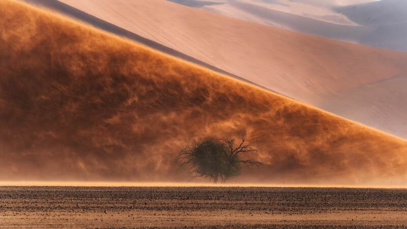 A windy sand dune creating a vision of turmoil on the dunes