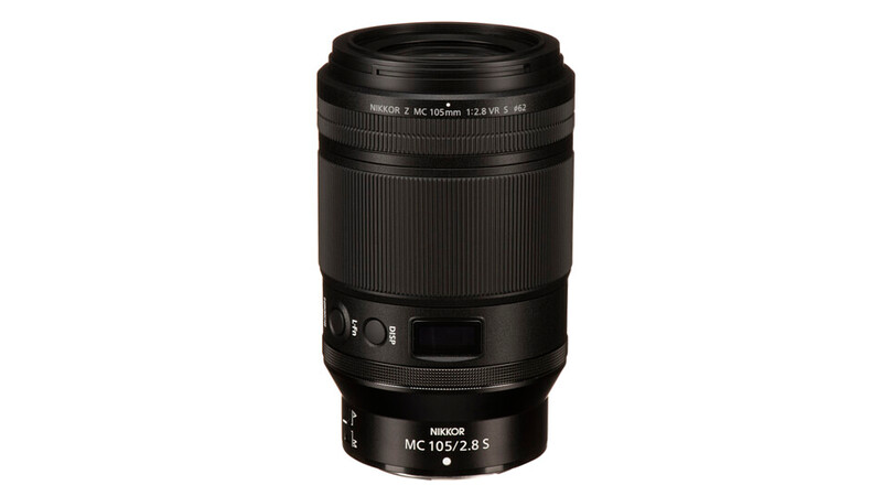 Nikon Z MC 105mm f/2.8 macro lens with black barrel and focus ring against white background.