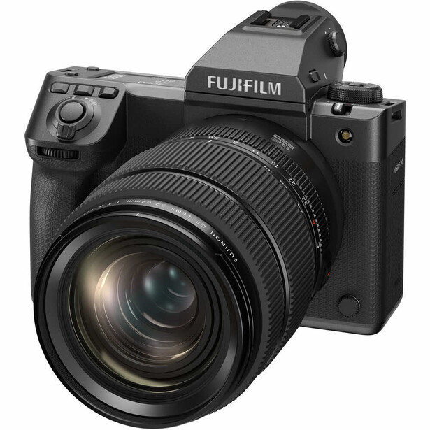 Fujifilm GFX mirrorless camera with attached standard zoom lens, shown against white background.