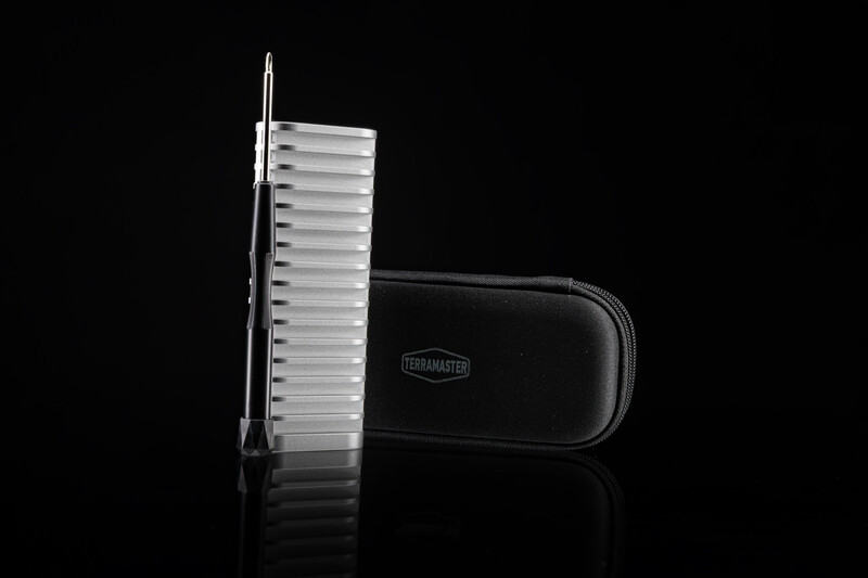 Dog grooming slicker brush and carrying case against black background
